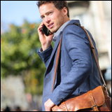 young man with leather bag